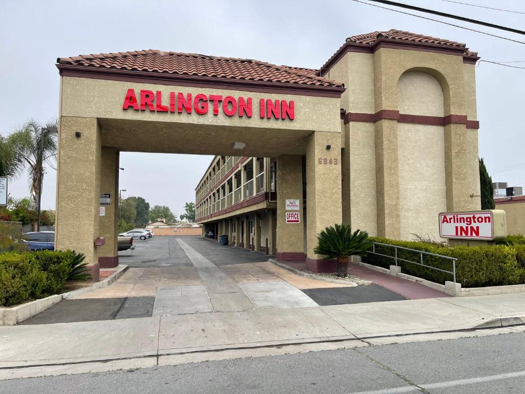 an entrance to a building with an infusion inn at Arlington Inn in Riverside