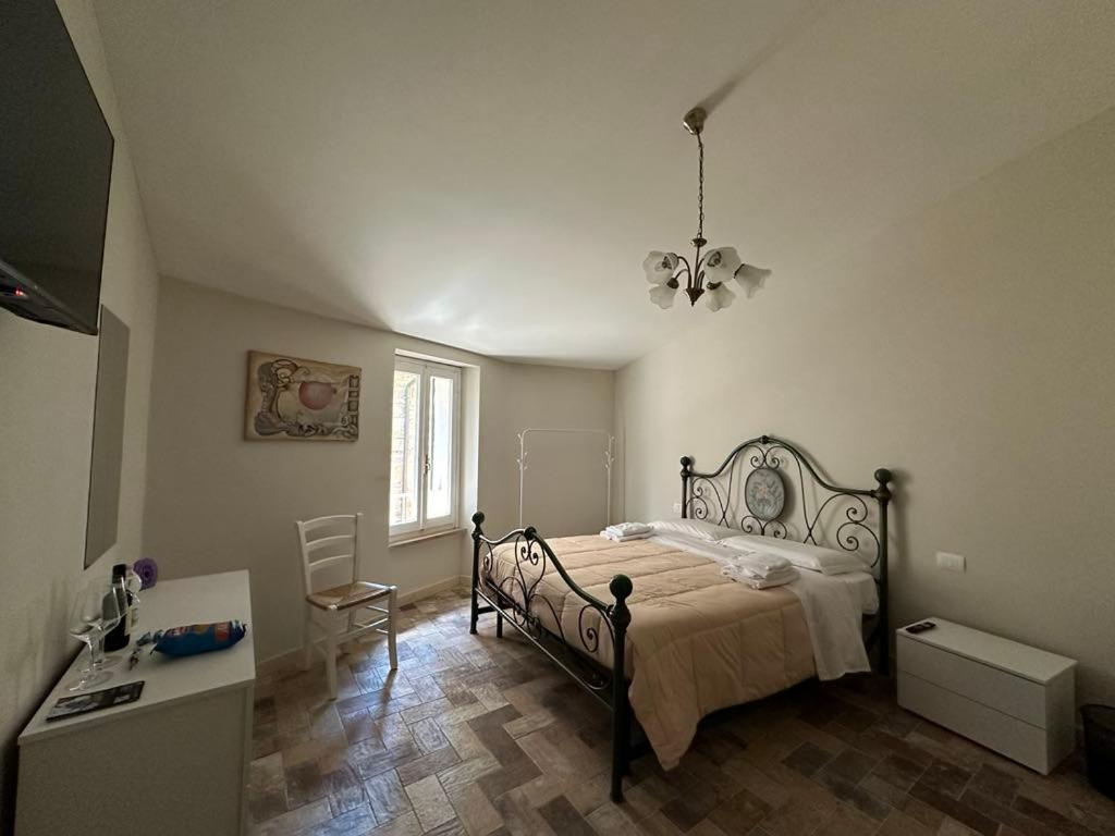 Postel nebo postele na pokoji v ubytování La dimora di Pino