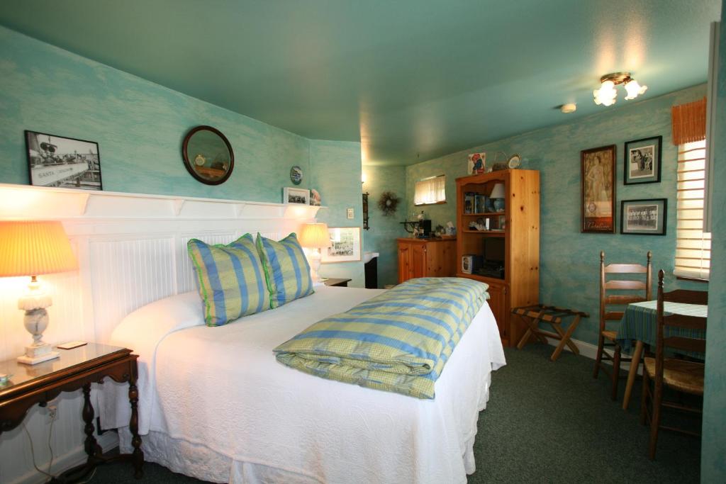 מיטה או מיטות בחדר ב-Country Cottage of Langley