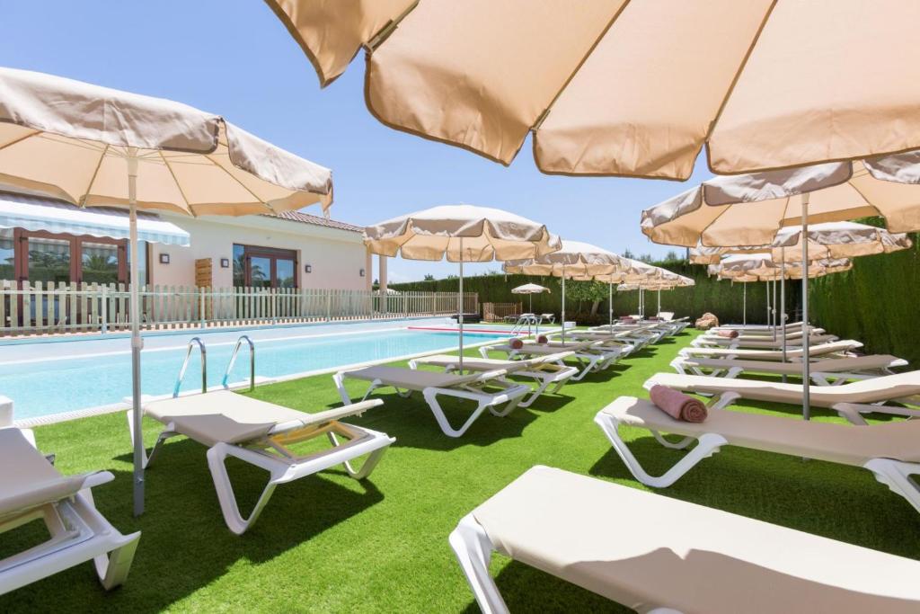 Bazén v ubytování Hotel Fortuny javea nebo v jeho okolí