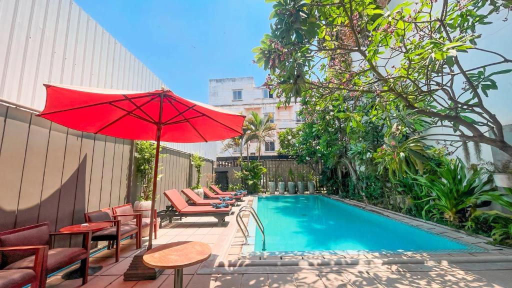 Bazén v ubytování Dusit Hotel Siem Reap nebo v jeho okolí