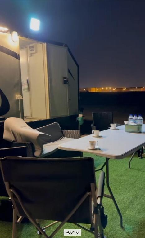 Posezení v ubytování VIP Caravan