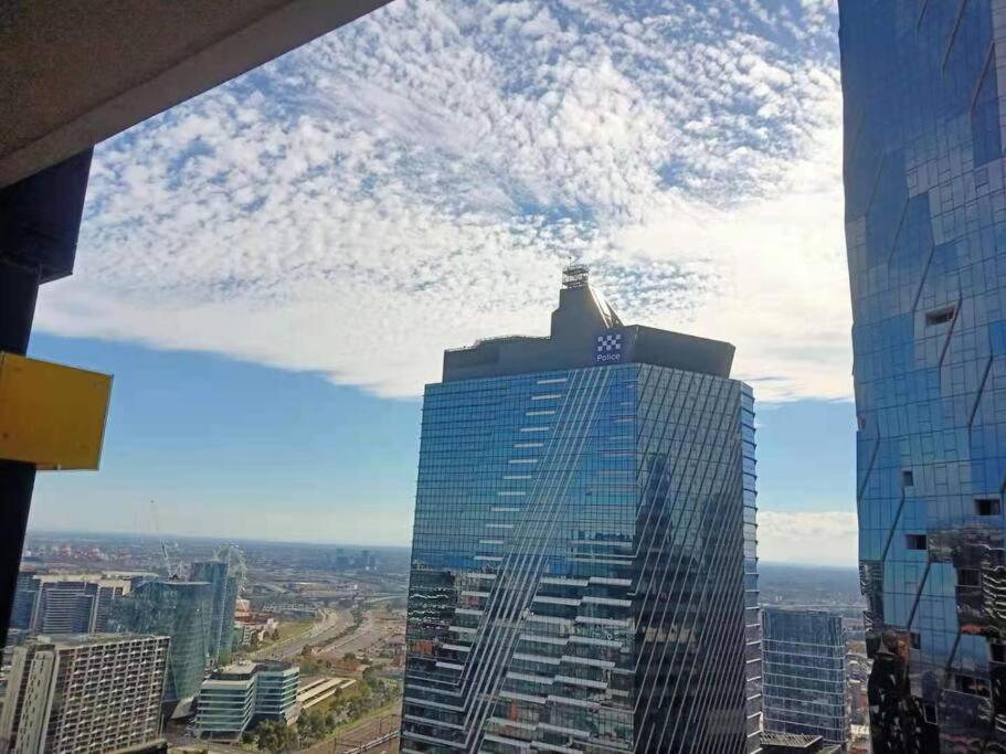 a view of a tall building in a city at L39 1Min to SouthernCross,free Gym, Pool, sunna,Tram ,Sauna in Melbourne