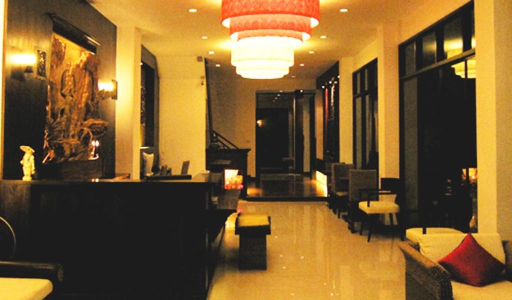 Posezení v ubytování Nicha Suite Hua Hin Hotel