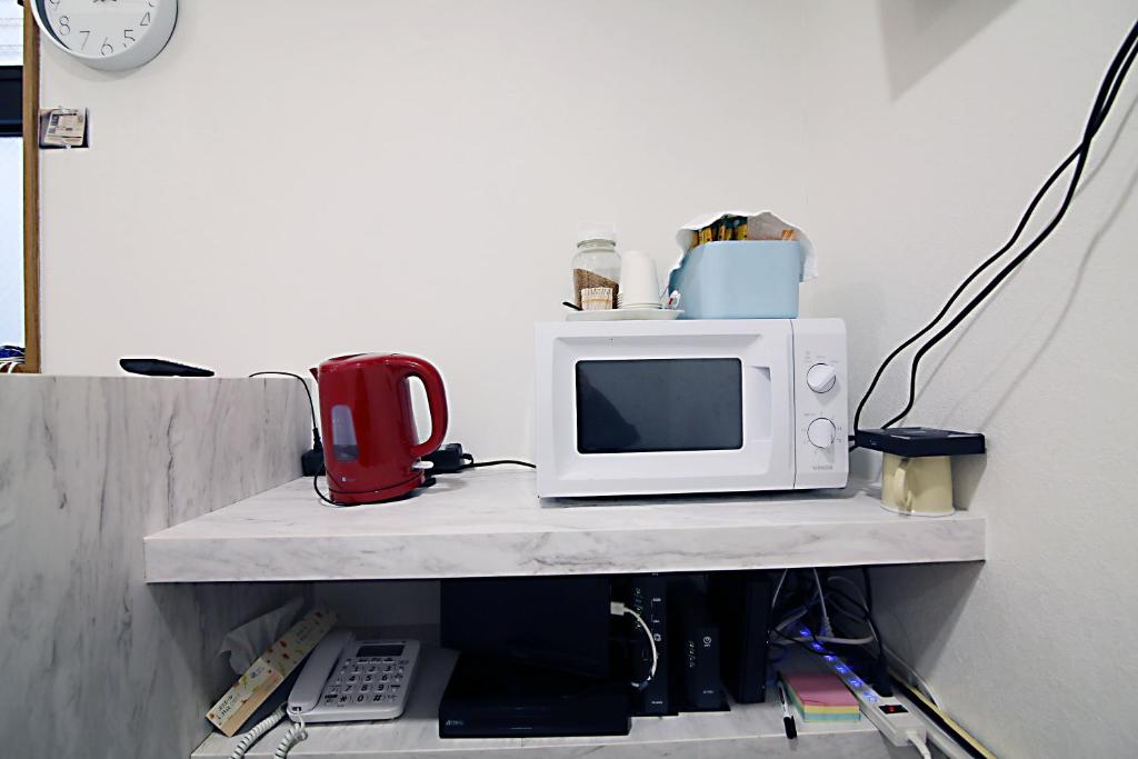 Kuchyň nebo kuchyňský kout v ubytování TOKYO MY HOME