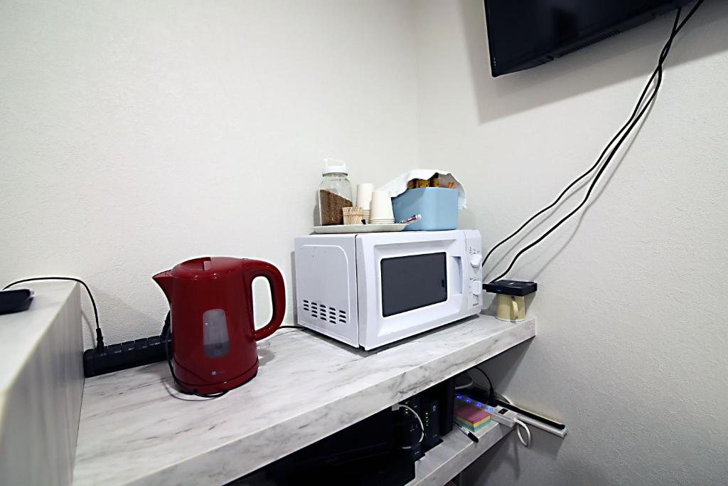 TV a/nebo společenská místnost v ubytování TOKYO MY HOME