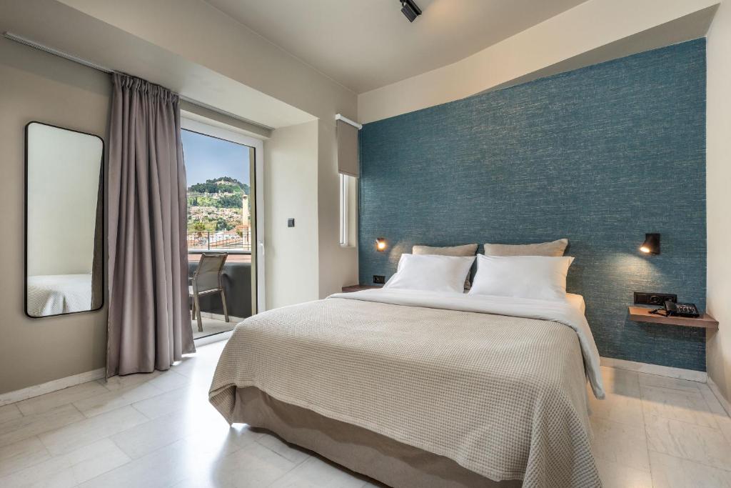 Posteľ alebo postele v izbe v ubytovaní Hotel Nafpaktos
