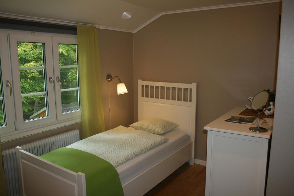 Postel nebo postele na pokoji v ubytování Hotel & Pensionat Björkelund