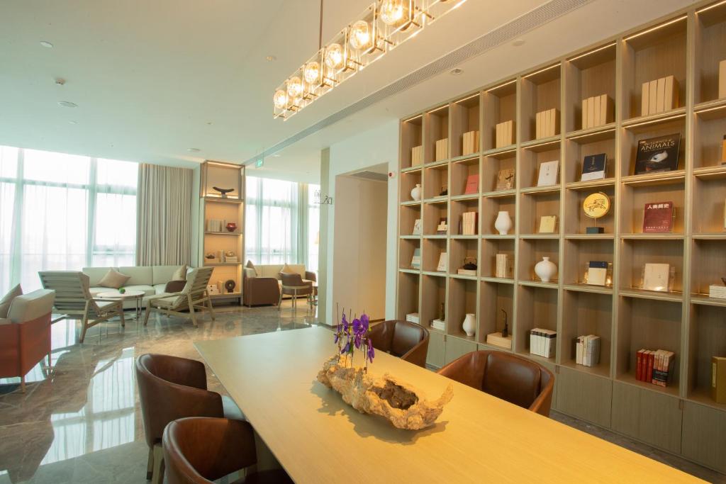 Posezení v ubytování Guangzhou Pazhou LN DongFang Hotel-Free shuttle between hotel and Exhibition Center during Canton Fair & Exhibitor Registration Counter