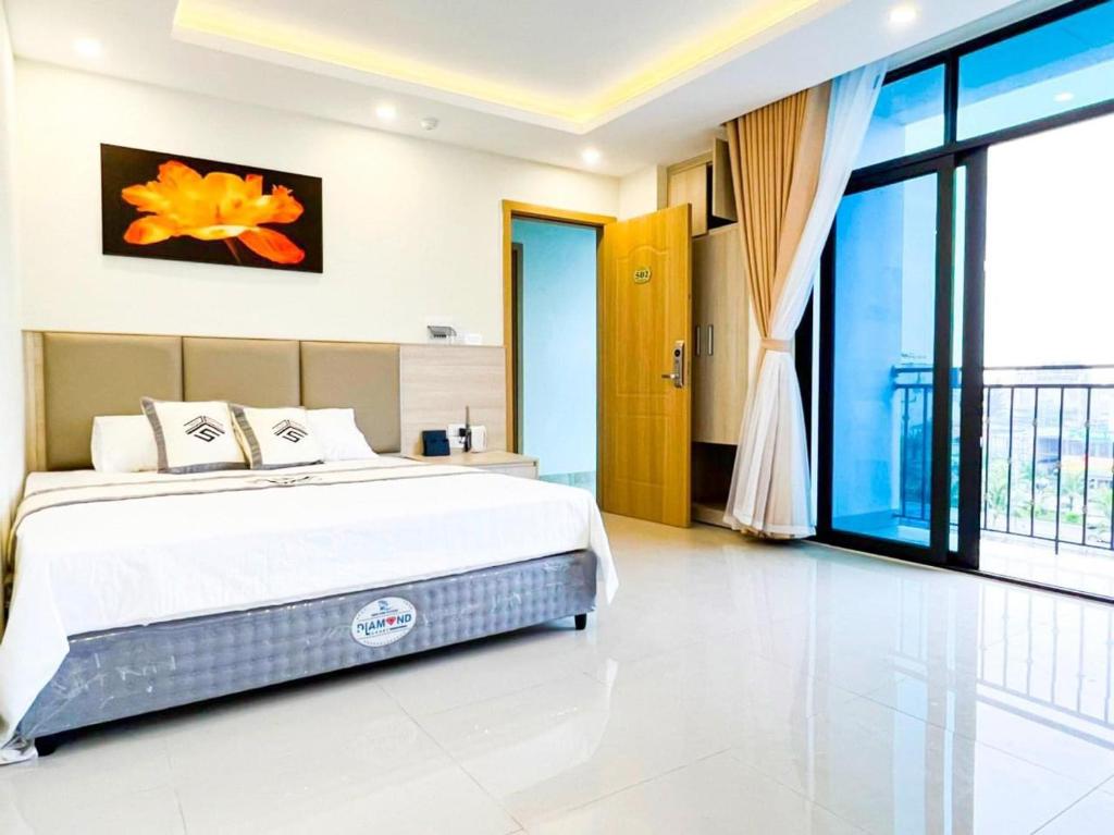 Giường trong phòng chung tại Khách sạn Việt Yên Sầm Sơn