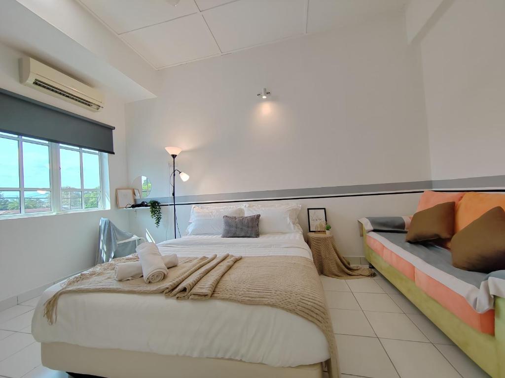 Postel nebo postele na pokoji v ubytování Sunway Tambun Salesman Stay 5 Bedroom 10pax by IWH