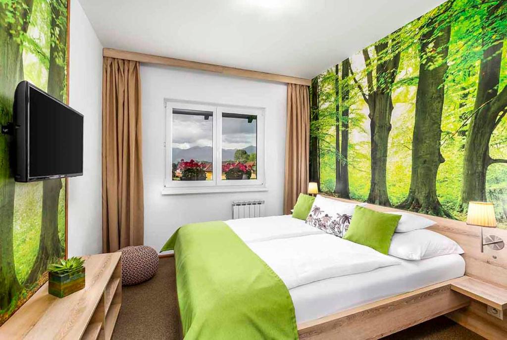 TV a/nebo společenská místnost v ubytování Hilson Jasna - Garden resort