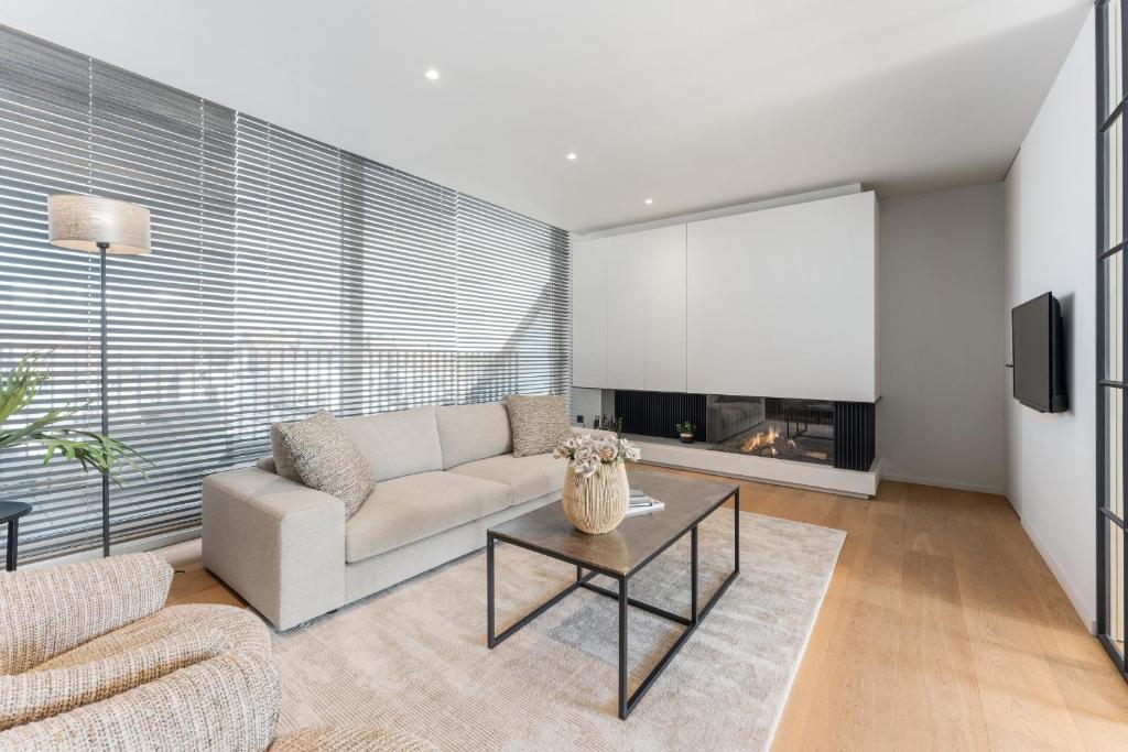 TV a/nebo společenská místnost v ubytování Maison Noomi Appartement or Suites