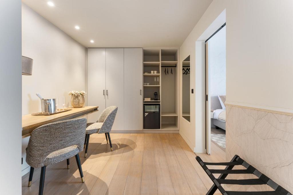 Kuchyň nebo kuchyňský kout v ubytování Maison Noomi Appartement or Suites