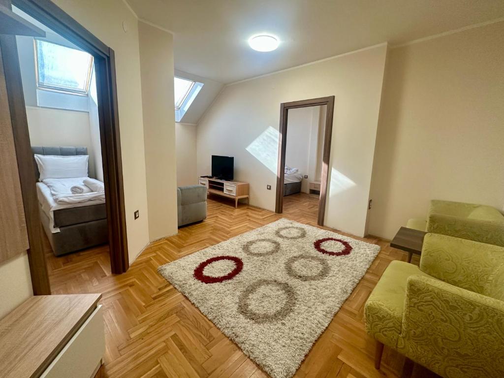 Μια τηλεόραση ή/και κέντρο ψυχαγωγίας στο Agape Villa Apartments