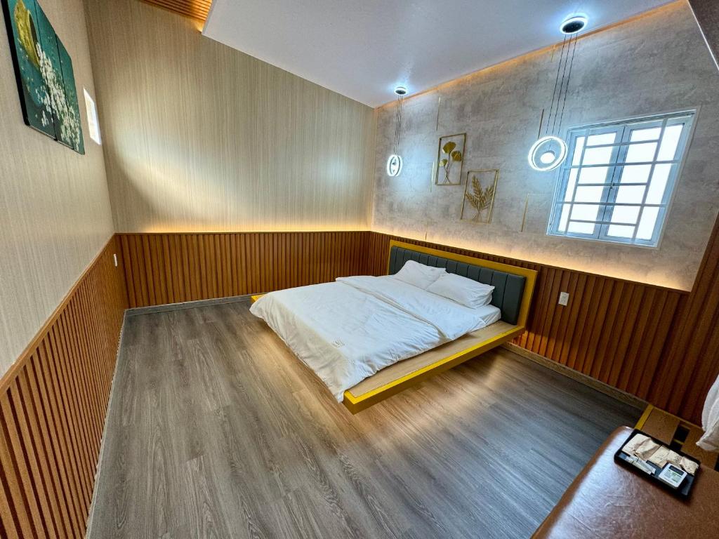 Postel nebo postele na pokoji v ubytování TONY HOMESTAY CẦN THƠ