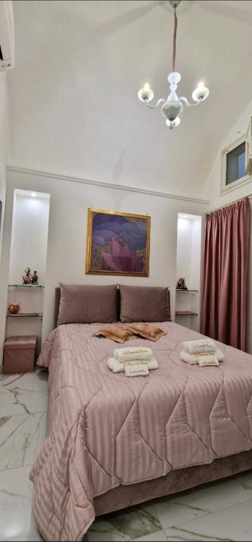 Letto o letti in una camera di La Corte dei Sarti
