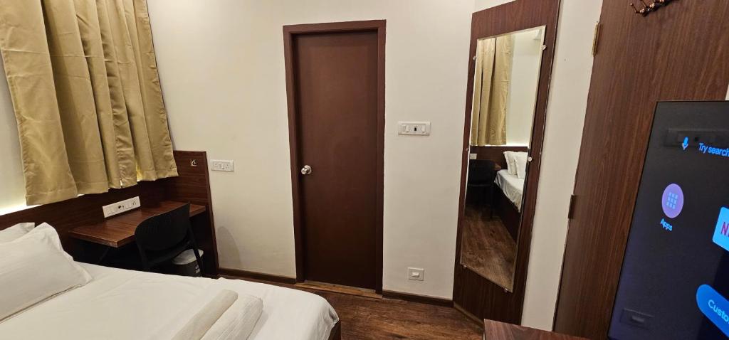Postel nebo postele na pokoji v ubytování Chippy Inn