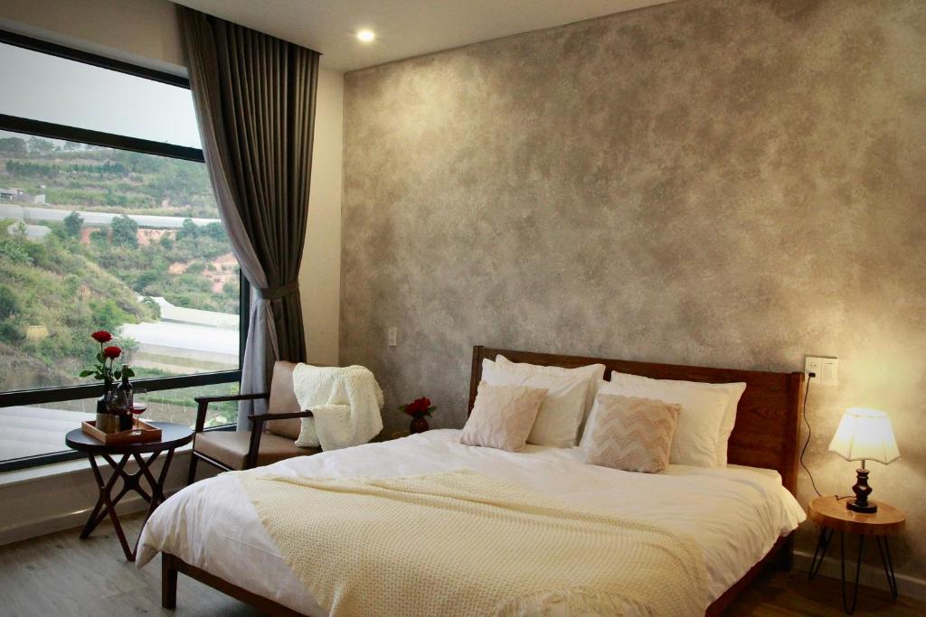 Florian Villa Dalat tesisinde bir odada yatak veya yataklar