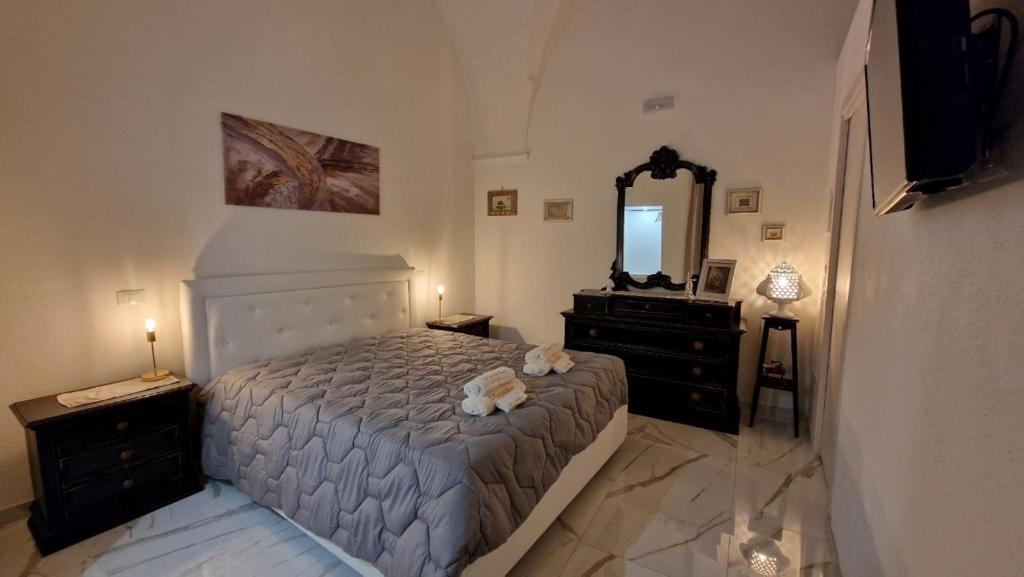 Letto o letti in una camera di La Corte dei Sarti