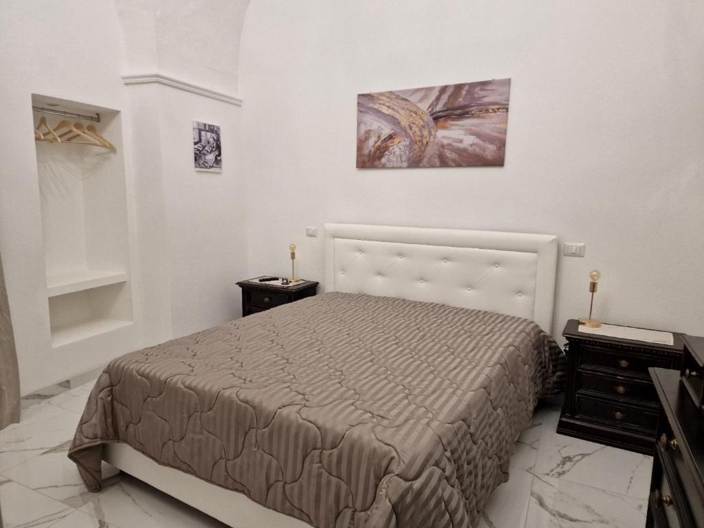 Letto o letti in una camera di La Corte dei Sarti