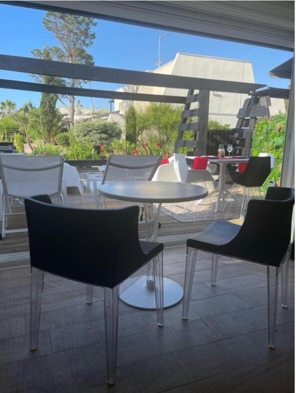 Photo de la galerie de l'établissement Village Naturiste VILLA 182 MARACUJA Port Nature 3, au Cap d'Agde