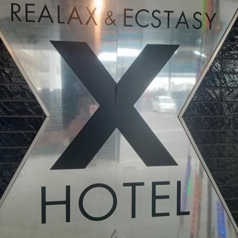 Certifikát, hodnocení, plakát nebo jiný dokument vystavený v ubytování X Hotel - Adult Only-