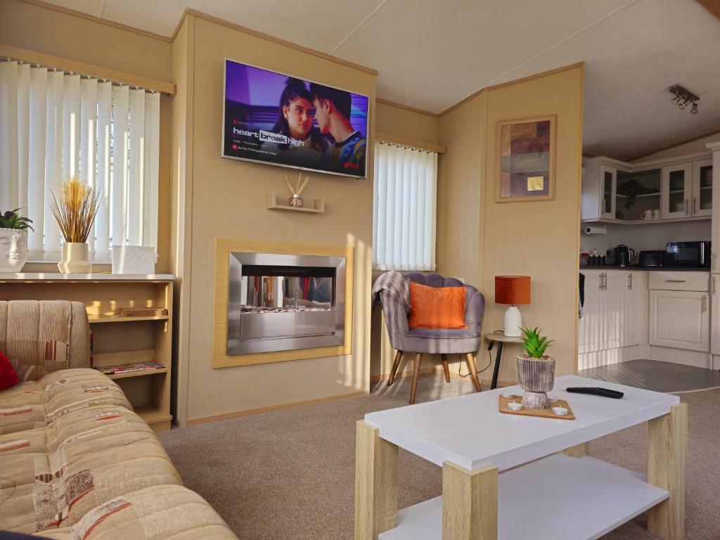 Kuchyň nebo kuchyňský kout v ubytování Vacanza Static Caravan