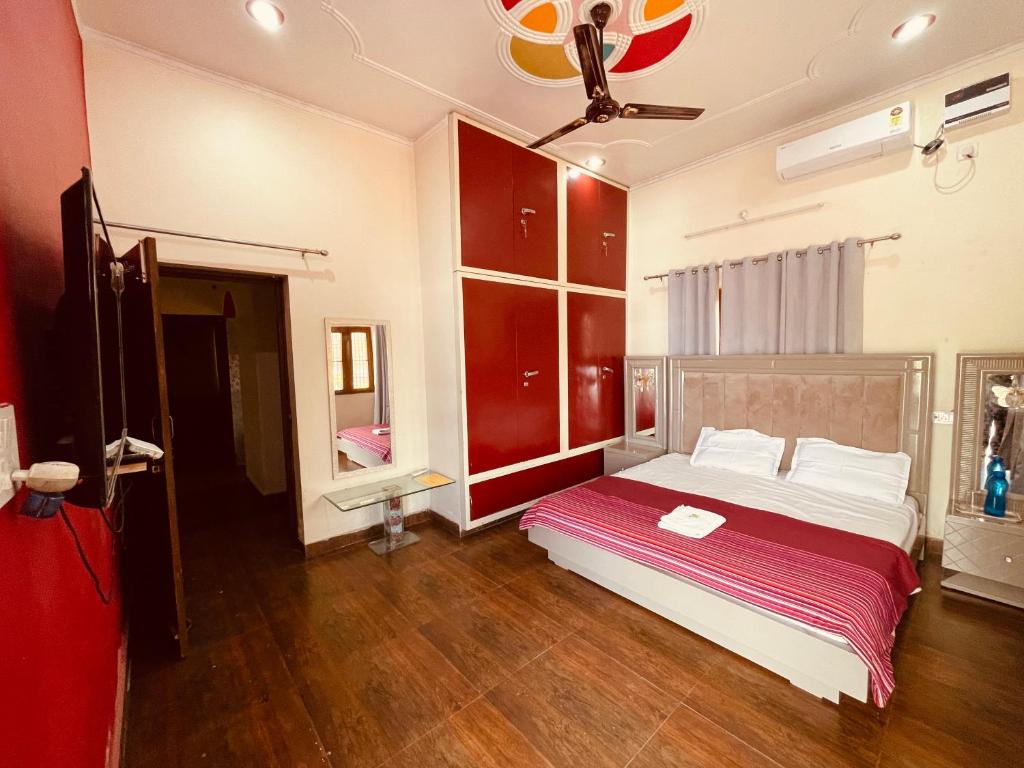 Postel nebo postele na pokoji v ubytování Stayble Homestay