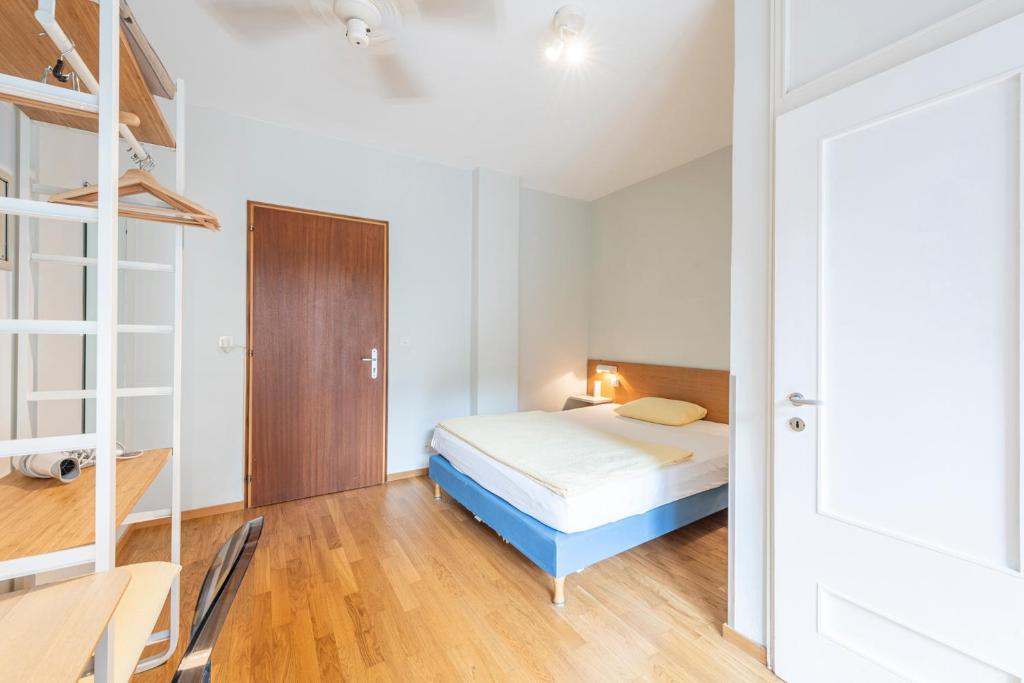 Una cama o camas en una habitación de Hotel Atlantico self check-in