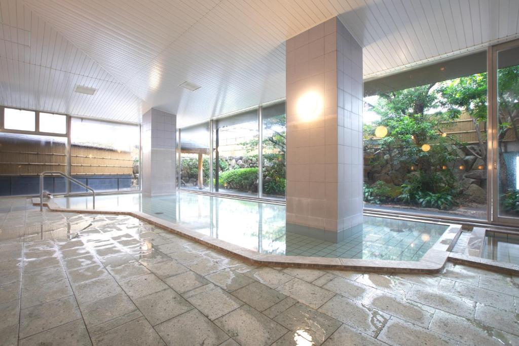 Bazén v ubytování U-BELL Hotel Matsumasa nebo v jeho okolí
