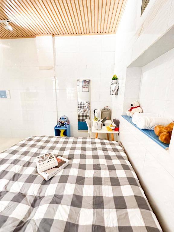 Postel nebo postele na pokoji v ubytování La Casa Di Dicembre Trần Hưng Đạo