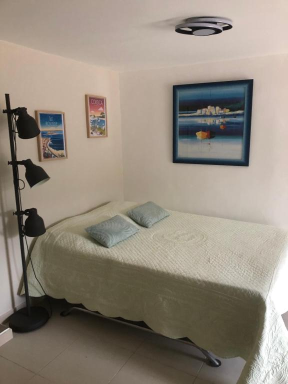 Posteľ alebo postele v izbe v ubytovaní Appartement dans la colline