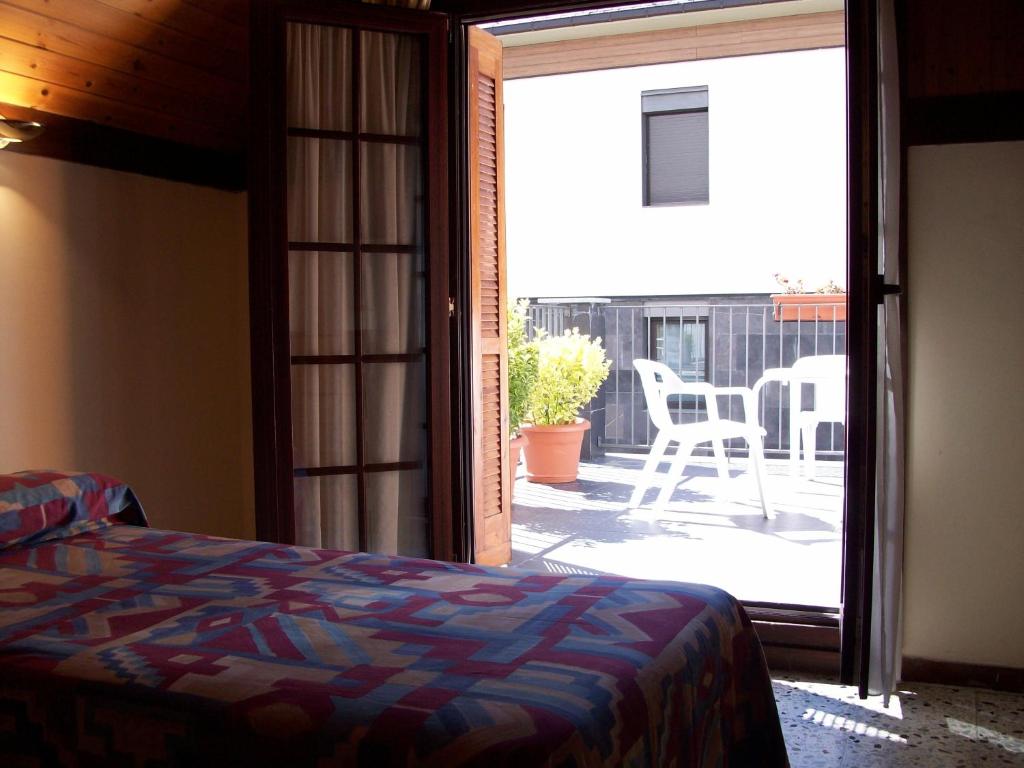 Postel nebo postele na pokoji v ubytování Hotel Delavall