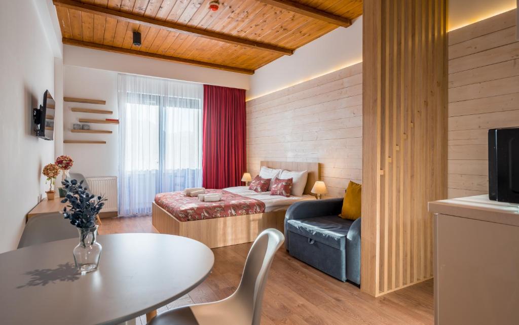 Postel nebo postele na pokoji v ubytování New Gudauri Ski4Life