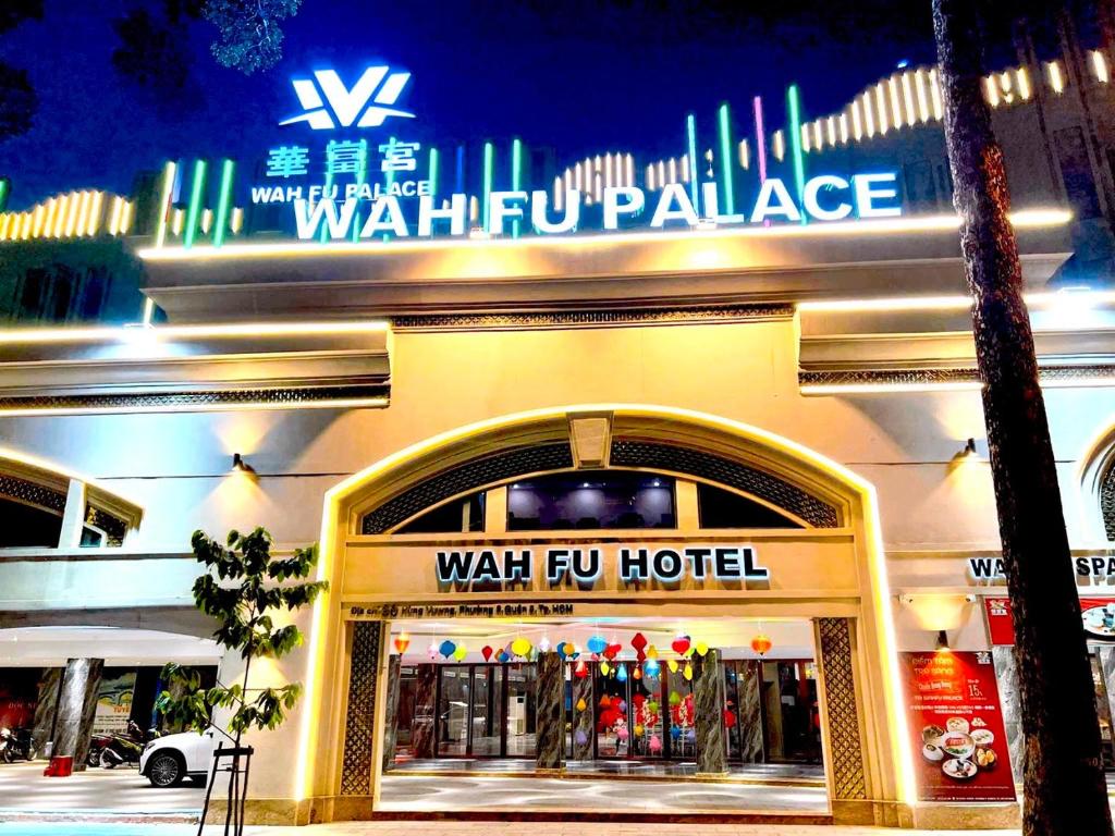 un bâtiment avec un panneau indiquant l'hôpital de la grippe à pied dans l'établissement Wah Fu Hotel, à Hô-Chi-Minh-Ville