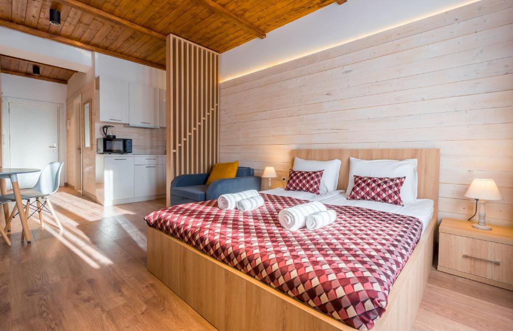 Postel nebo postele na pokoji v ubytování New Gudauri Ski4Life