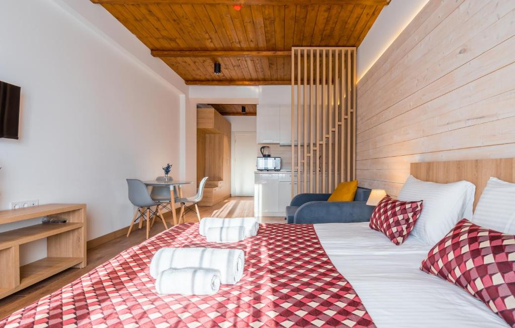 Postel nebo postele na pokoji v ubytování New Gudauri Ski4Life