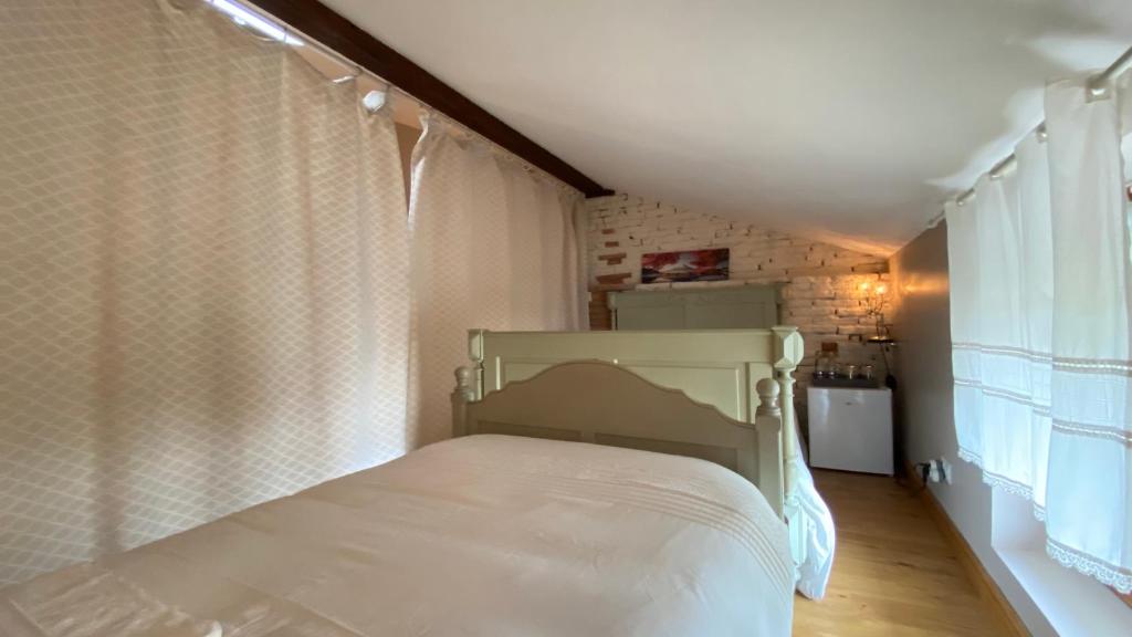 Postel nebo postele na pokoji v ubytování Le Clos du Cèdre