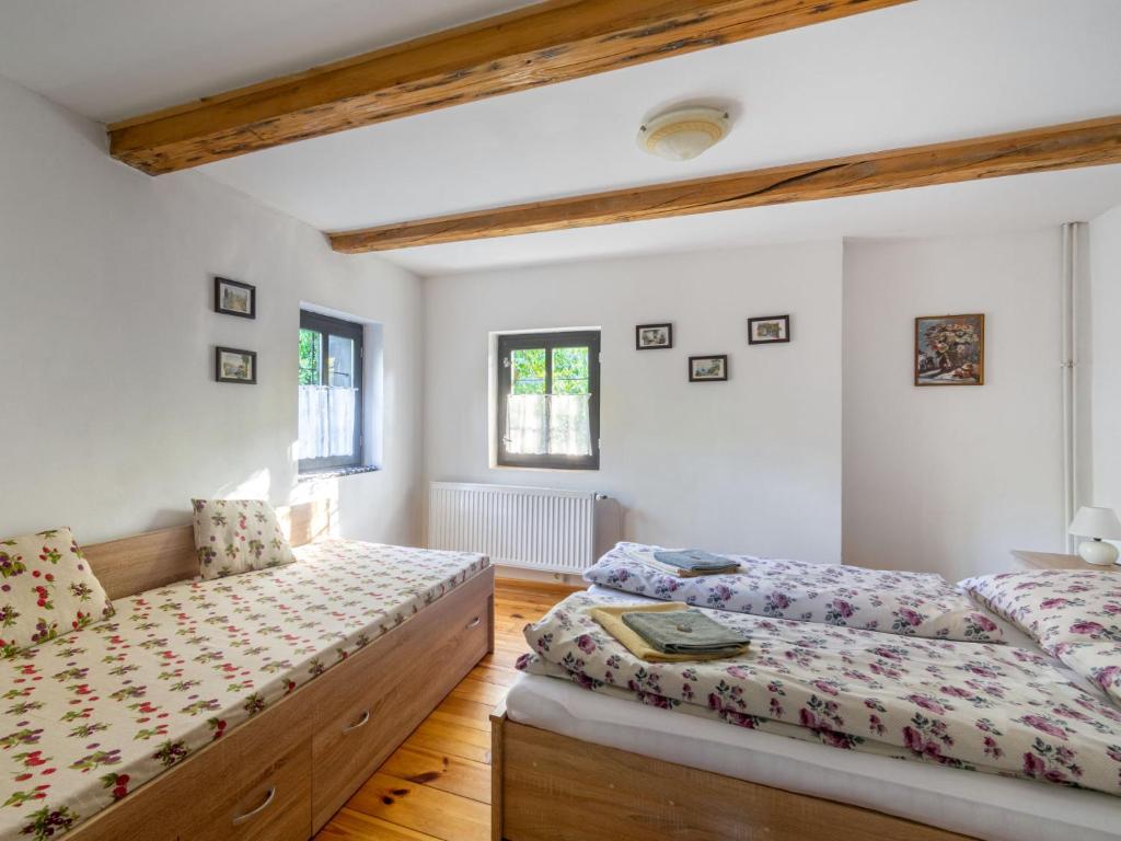 Postel nebo postele na pokoji v ubytování Holiday Home Horní Prysk by Interhome