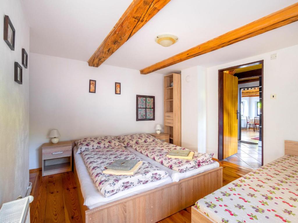 Postel nebo postele na pokoji v ubytování Holiday Home Horní Prysk by Interhome