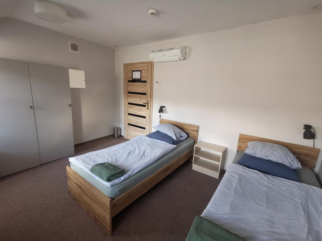 Posteľ alebo postele v izbe v ubytovaní Bemma Apart Hostel