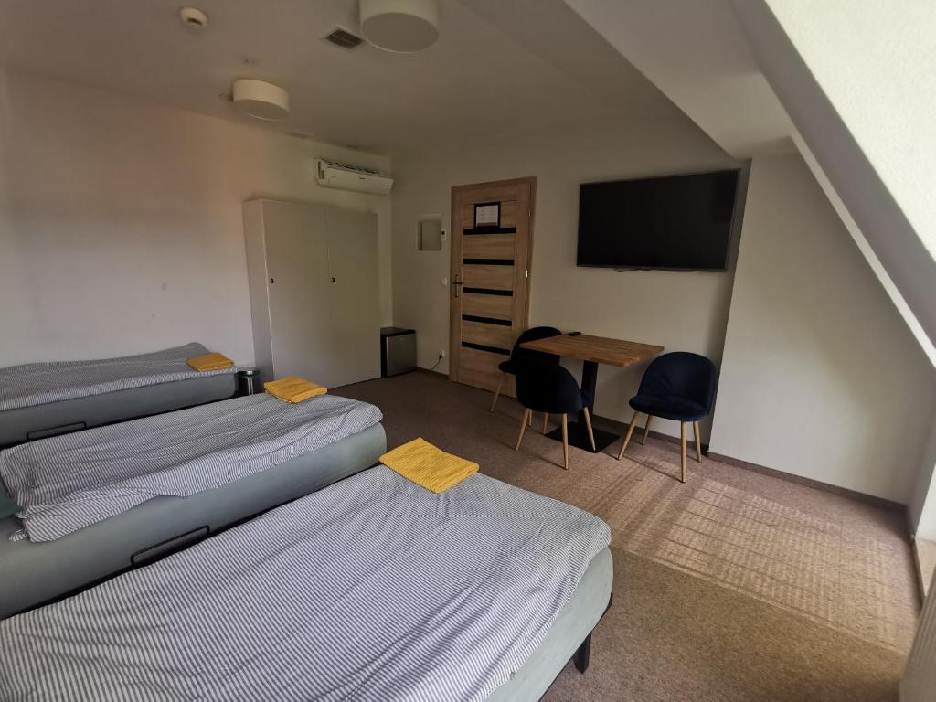 Posteľ alebo postele v izbe v ubytovaní Bemma Apart Hostel