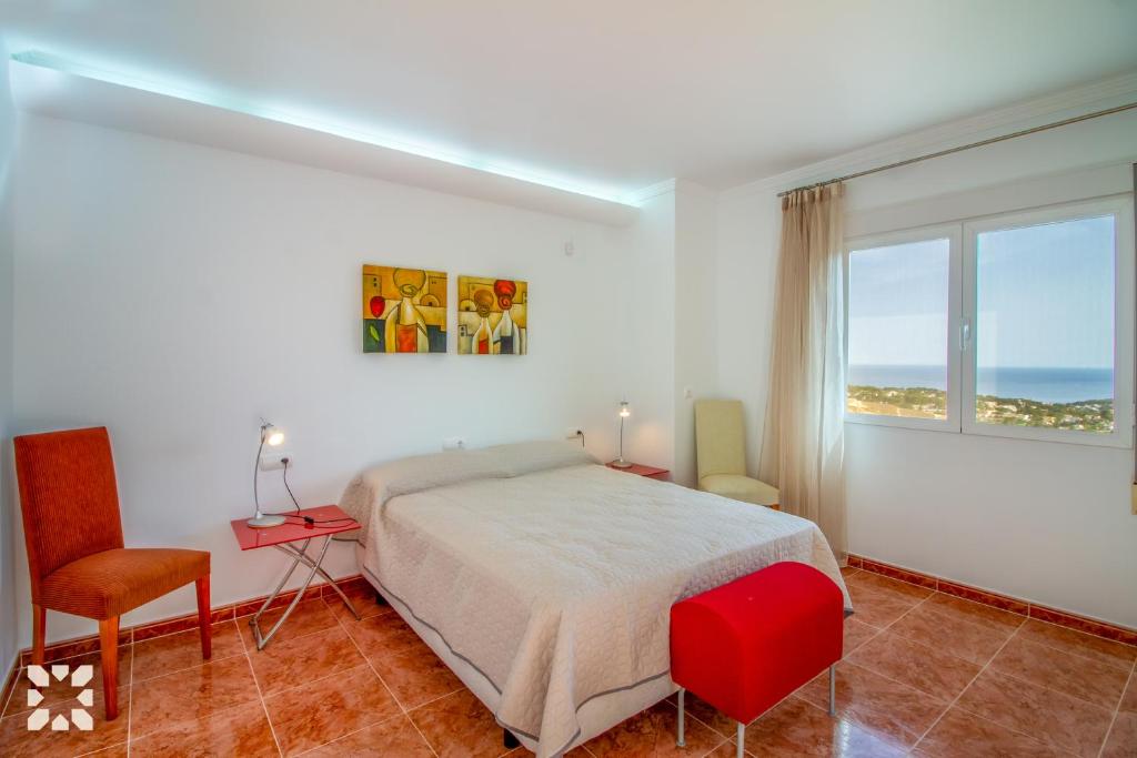 Posteľ alebo postele v izbe v ubytovaní Villa Treveris by Abahana Villas