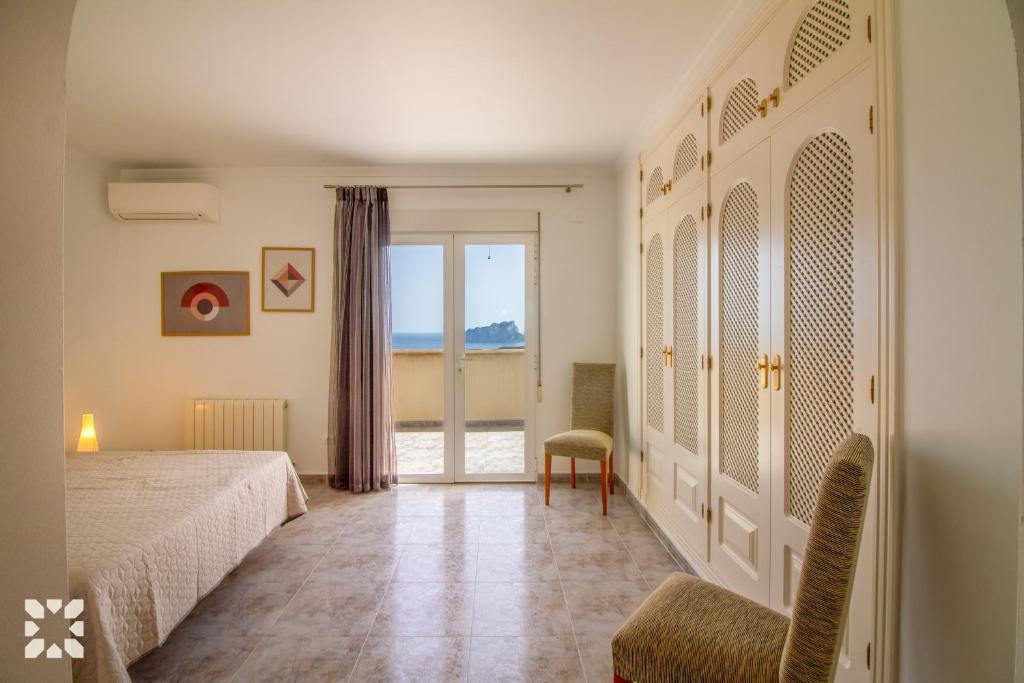 Posteľ alebo postele v izbe v ubytovaní Villa Treveris by Abahana Villas