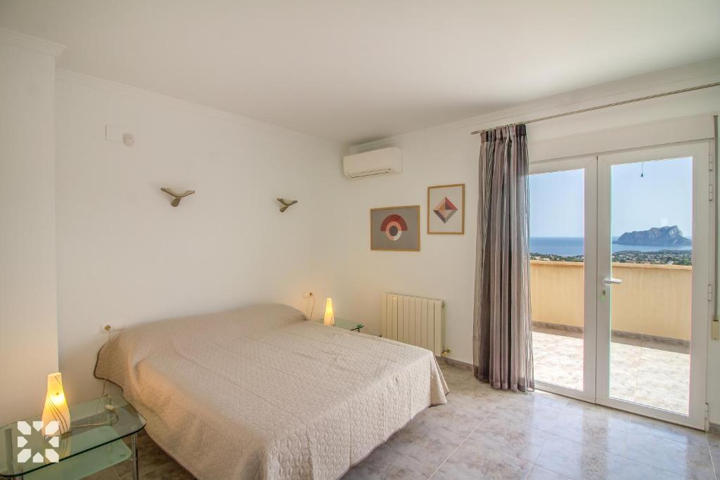 Posteľ alebo postele v izbe v ubytovaní Villa Treveris by Abahana Villas