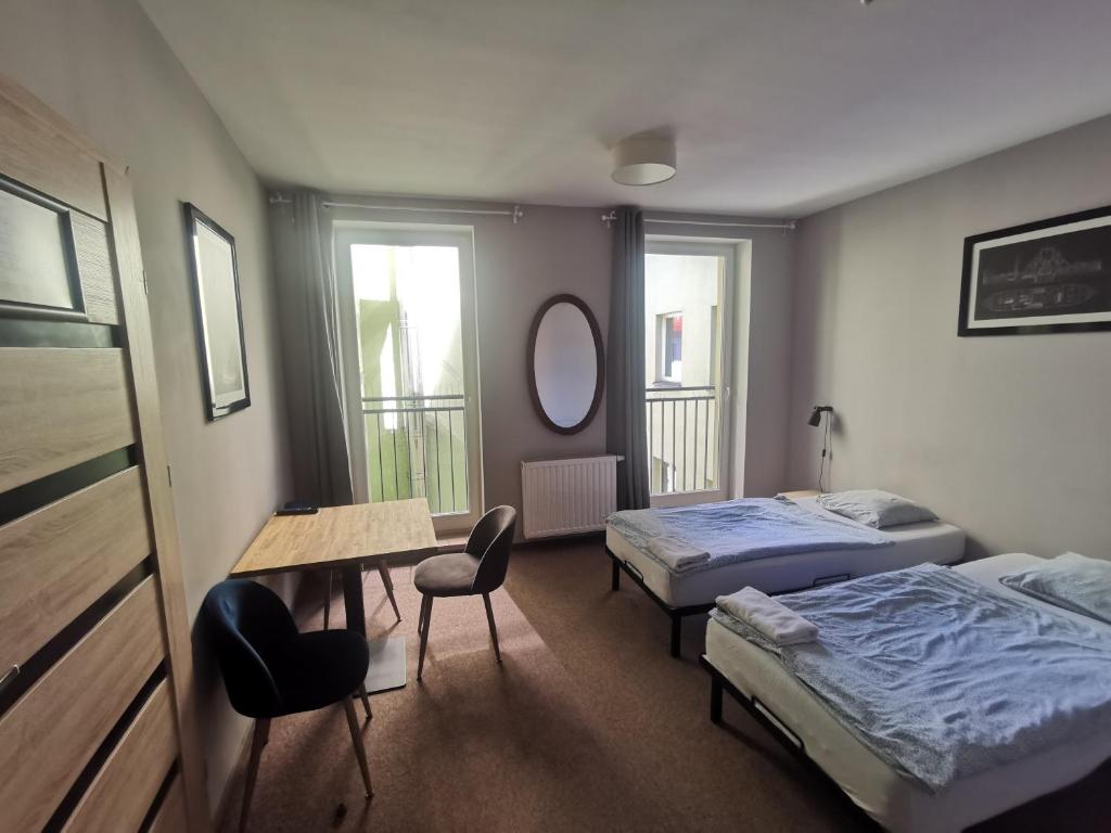 Posteľ alebo postele v izbe v ubytovaní Bemma Apart Hostel