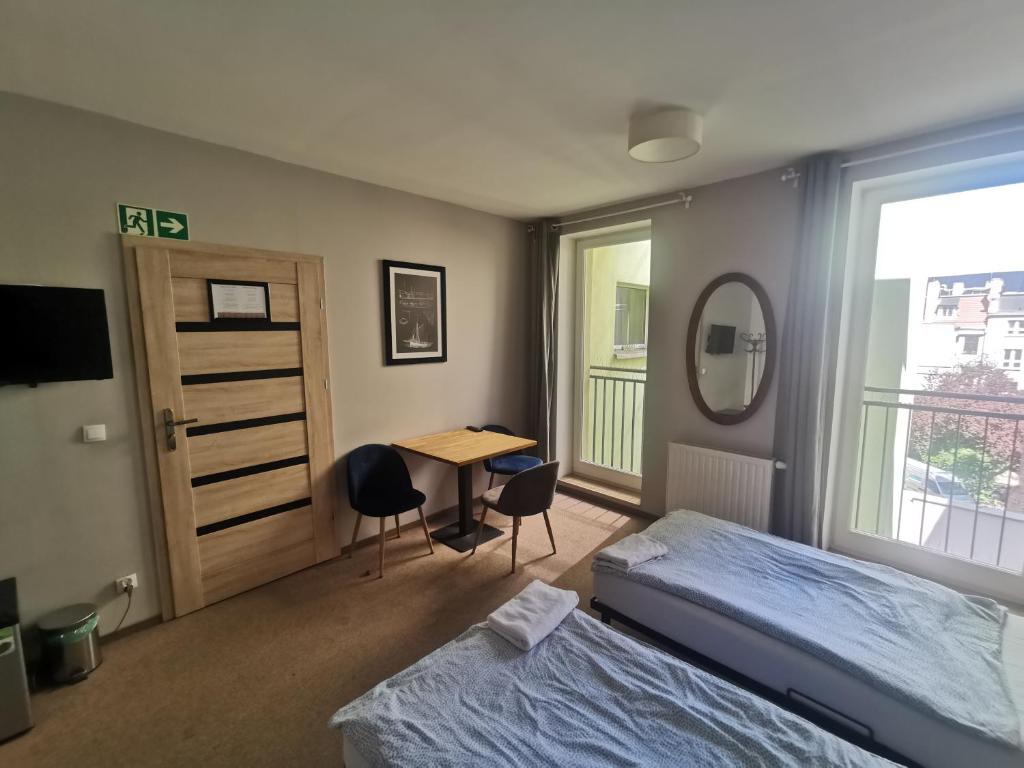 Posteľ alebo postele v izbe v ubytovaní Bemma Apart Hostel