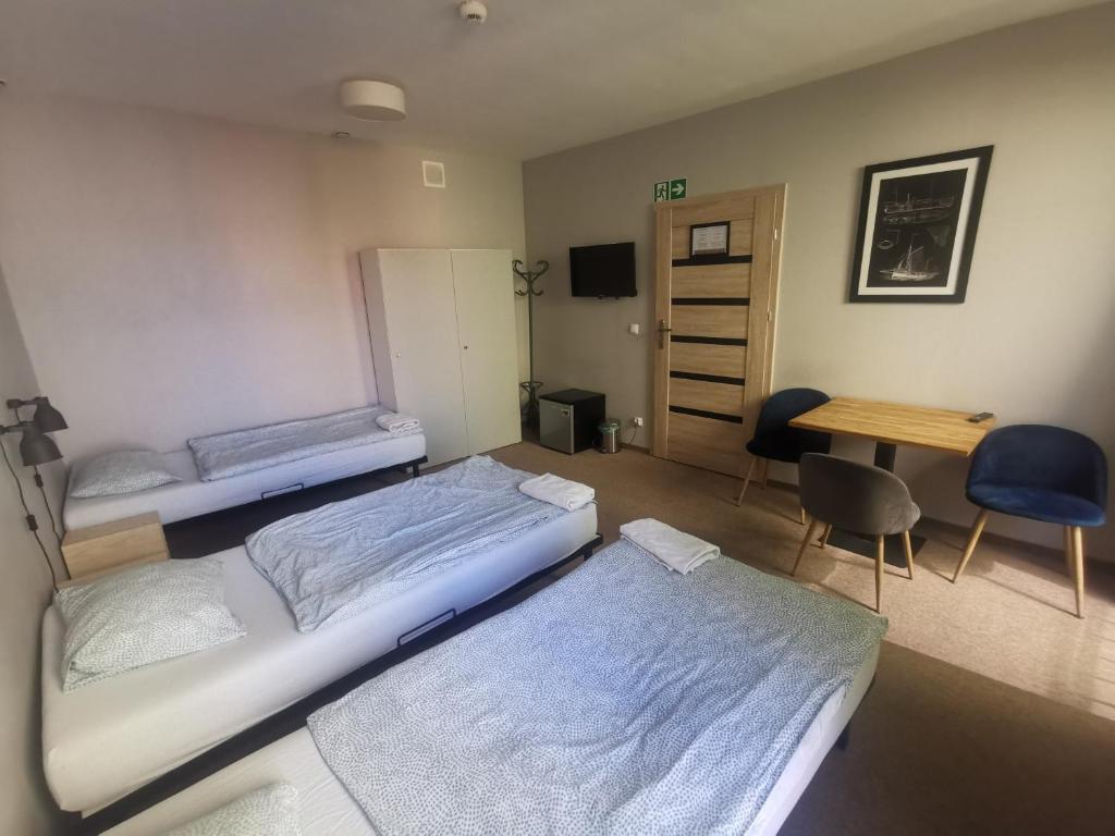 Posteľ alebo postele v izbe v ubytovaní Bemma Apart Hostel