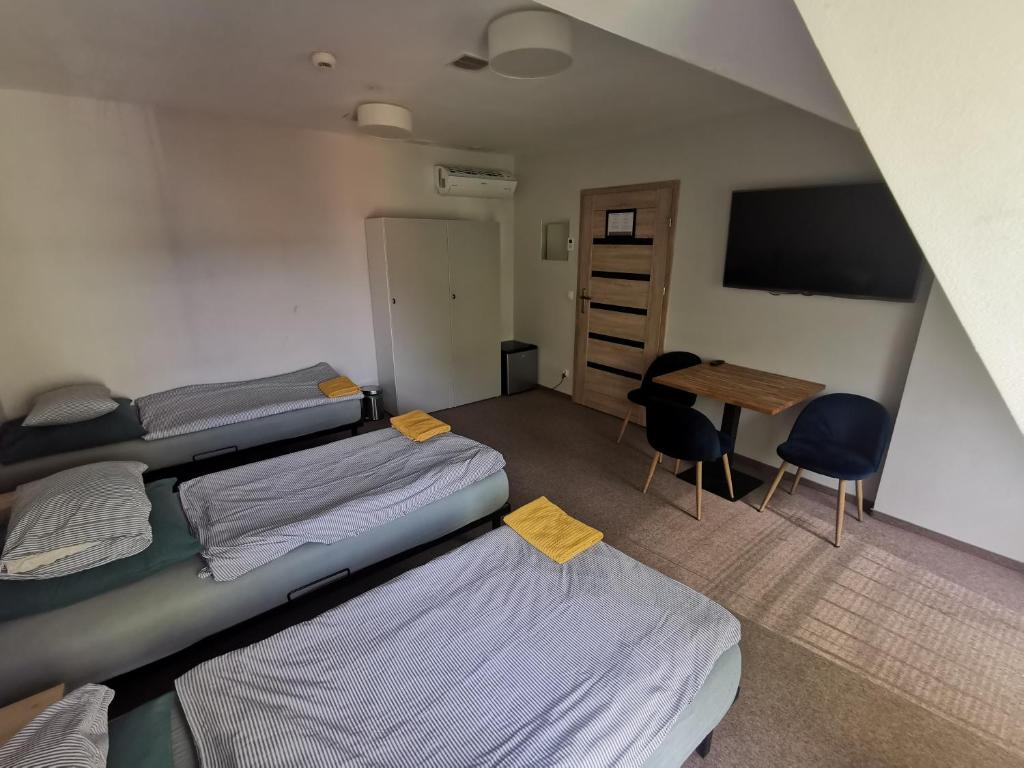 Posteľ alebo postele v izbe v ubytovaní Bemma Apart Hostel